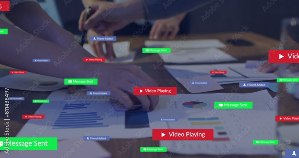Poster image of notification bars over midsection of diverse coworkers discussing reports in office