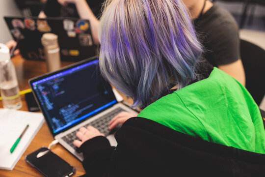Female software developer students working on computer and laptop, programming contest hackathon competition, pc with coding program app, competitive programming for software engineer