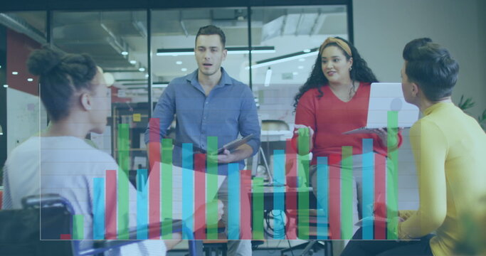 Image of statistical data processing against team of diverse colleagues discussing at office