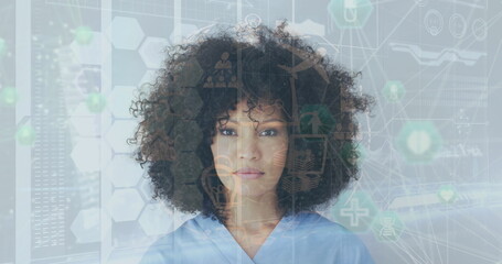 Image of network of connections with icons over biracial woman looking at camera - Powered by Adobe