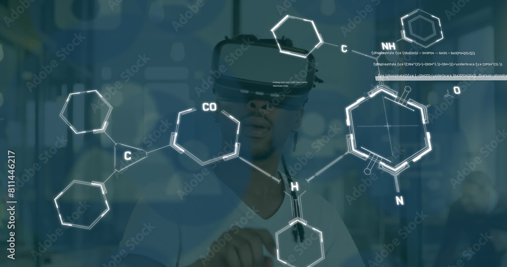 Poster image of data processing and media icons over biracial man using vr headset