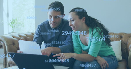 Image of data processing over caucasian couple using laptop