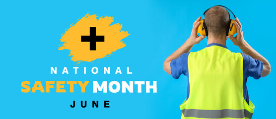 Male worker in vest and with protective headphones on blue background, back view