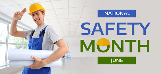 Male builder with wallpapers saluting in room