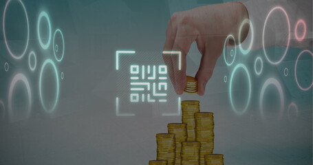 Image of qr code and circles over cropped hand of caucasian man placing coins on piles