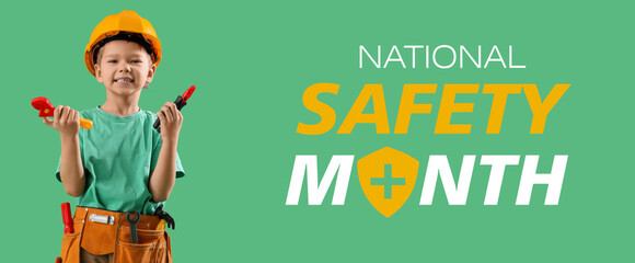 Cute little builder with toy tools on green background