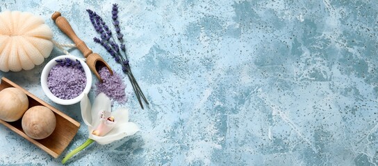 Beautiful spa composition with lavender on blue background with space for text