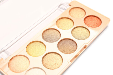 Palette of modern bright eyeshadows on white background, closeup