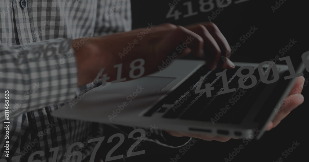 Poster image of data processing over hands using laptop