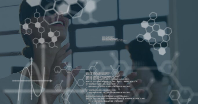 Image of data processing over caucasian woman with vr headset