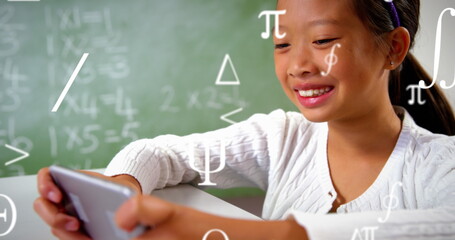 Image of mathematical symbols over asian girl using smartphone