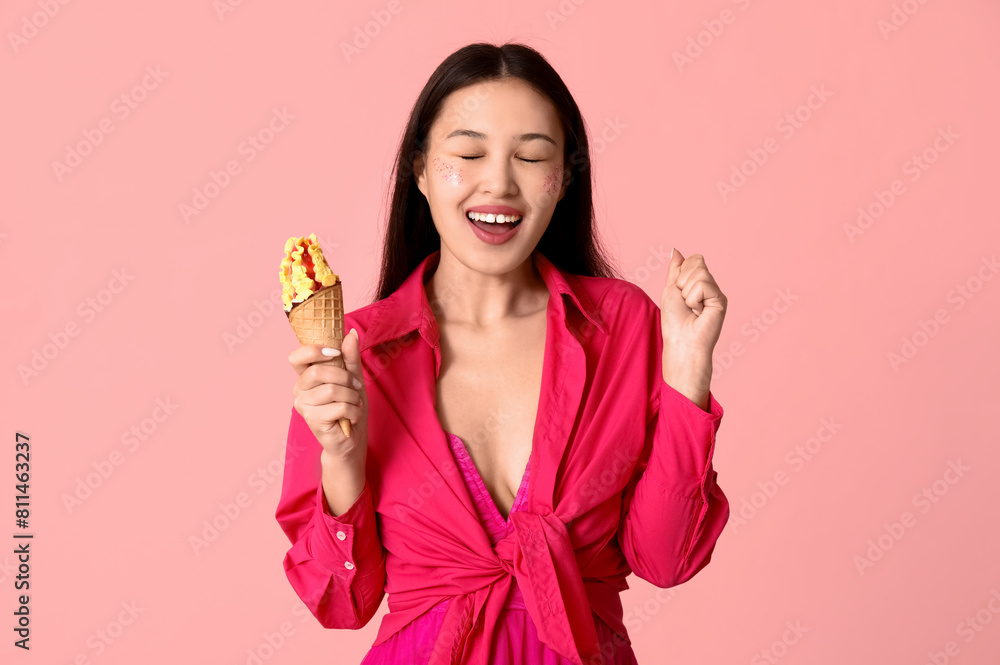 Sticker beautiful happy asian woman with mango ice-cream on pink background