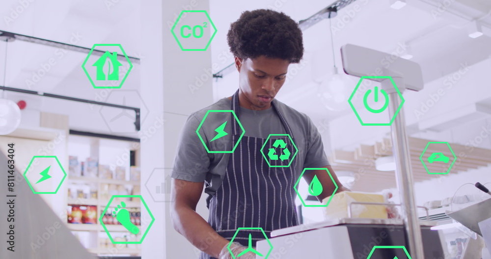Poster image of icons and data processing over biracial man serving food in shop