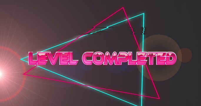 Image of level completed text and shapes over light spots on black background - Powered by Adobe