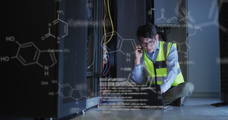 Image of medical data processing over asian male engineer talking on smartphone at server room