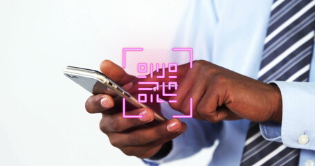 Image of qr code over midsection of african american businessman using smartphone