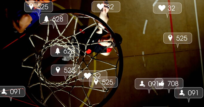 Image of notification bars over diverse basketball players playing match in basketball court - Powered by Adobe