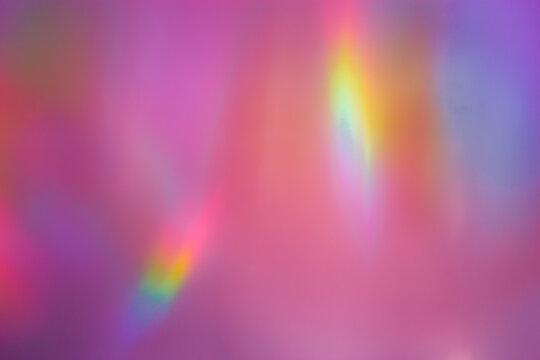 Sunlight background, abstract photo with sunshine and rainbow flare, vivid colored minimal photo. Prism light and caustic effects texture, trendy aesthetic view diffraction sunbeams, blur glow
