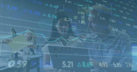 Obraz premium Image of stock market data processing over diverse colleagues discussing over laptop at office