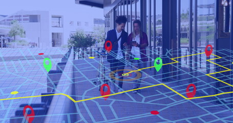 Naklejka premium Image of city map over diverse people walking with bike