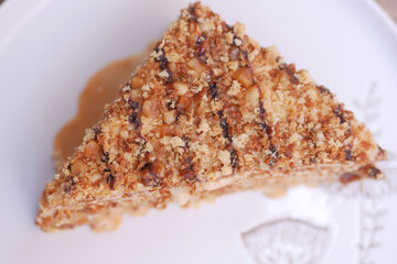 chocolate and cream cake on a plate on table 