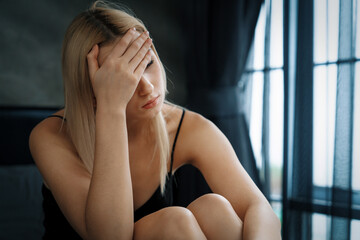 Young woman with critical depression and anxiety disorder from loneliness, mental sickness, or...