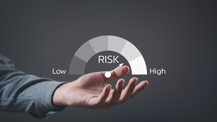CEO manager management. Businessman showing risk level indicator rating since low to high for risk...