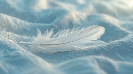 A tranquil scene showcasing a single, delicate white feather delicately placed on a smooth, soft fabric surface