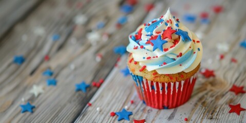 A patriotic-themed cupcake with a red, white, and blue frosting topped with star-shaped sprinkles, presented against a blurry background. 4th of July, american independence day, memorial day concept - Powered by Adobe