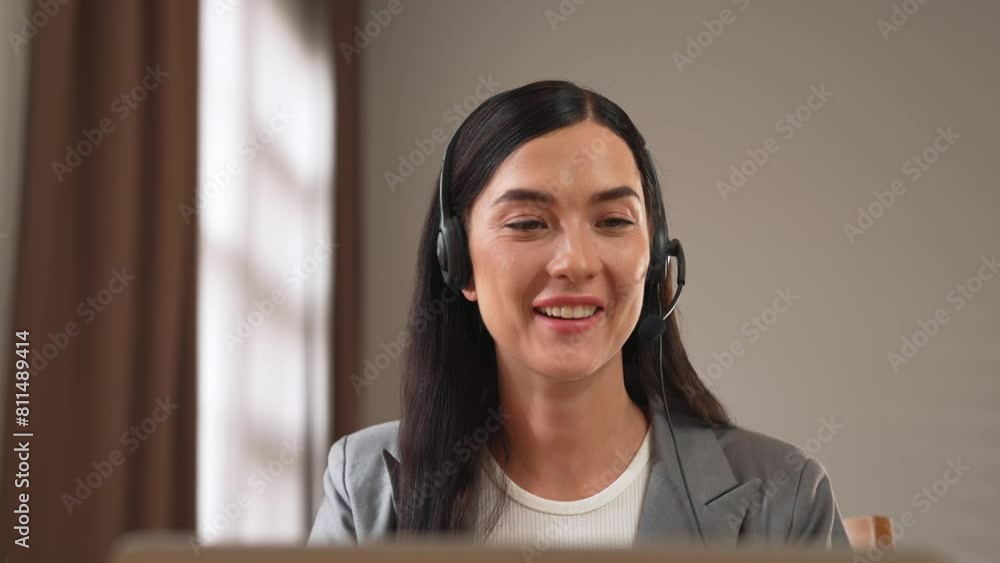 Aufkleber female call center operator or customer service helpdesk staff working on workspace while talking on