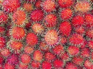 Fototapeta premium Rambutan fruit for sale at the market.