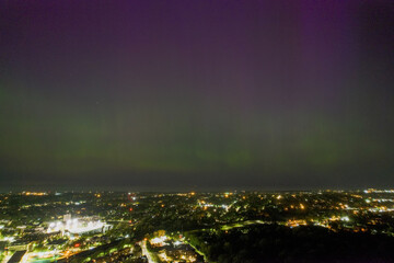 An aerial view of the Aurora Borealis over Cleveland, Ohio on May 5th, 2024. The Northern Lights are green near the horizon but became purple higher up.