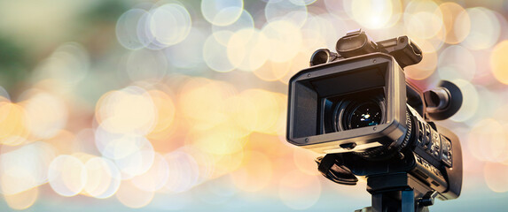 Video camera with blur background for journalist interview broadcasting reporter news or press...
