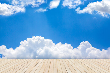 Blue sky and clouds with wooden floor and space for add text above
