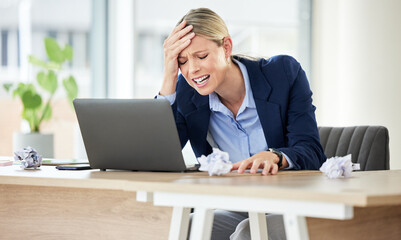 Headache, woman and laptop in office with sad accountant with audit problem and internet issue....