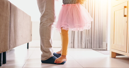 Father, child and dancing on feet in home with music, radio or bonding with love in living room....