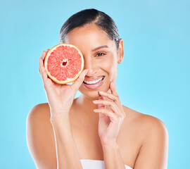 Model, beauty and grapefruit with skincare glow from spa treatment and natural cosmetics. Woman,...