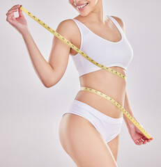 Progress, underwear and woman with tape measure on stomach for wellness, digestion and lose weight....
