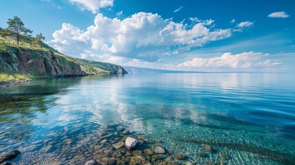 Beautiful shore of Baikal lake, cloud over the water.