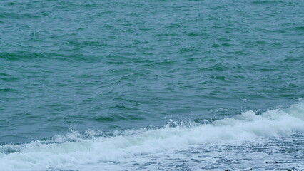 Calm Waves On A Open Ocean. Foaming And Splashing Waves In Ocean Or Sea. Slow motion.