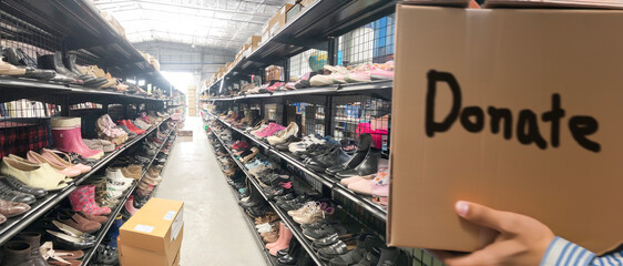 The business buys and sells used shoes received from donations from developing countries in...