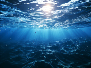 Underwater scene with sunlight penetrating the ocean, blue tones dominating, concept of marine environment. Generative AI