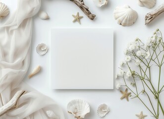 a blank white wedding card mock-up - flatlay with a beach vacation setting