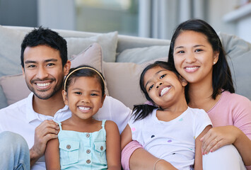 Smile, happiness and portrait of family on sofa in living room for care, love and bonding together...