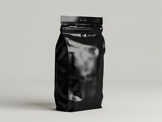 A black coffee bag on a white surface.