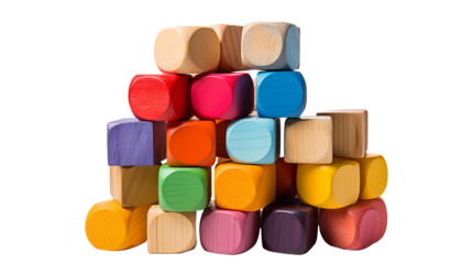 Colorful wooden blocks of different sizes are stacked in a pyramid shape on a black background.