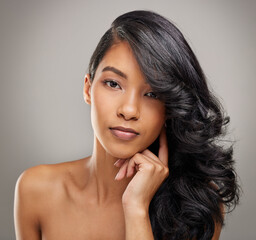 Studio, portrait and hair care for woman while relaxing, cosmetics or healthy texture by mockup....