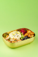 bowl with shrimp, vegetables, cheese and sauce