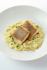 grilled fish with vegetables and sauce