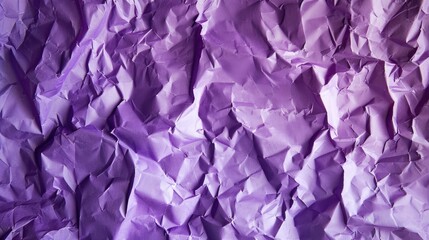 Purple crumpled paper texture background from above